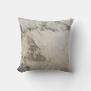 Cojín Decorativo Fondo de textura de piedra de mármol marrón claro.