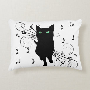 Cojín Decorativo Gato negro rodeado de notas susurrantes de música