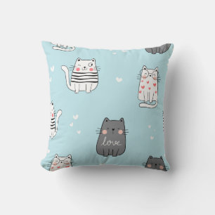 Cojín Decorativo Gatos juguetones con un patrón azul