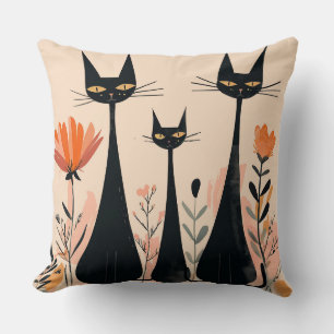 Cojín Decorativo Gatos negros entre flores y follaje vibrantes