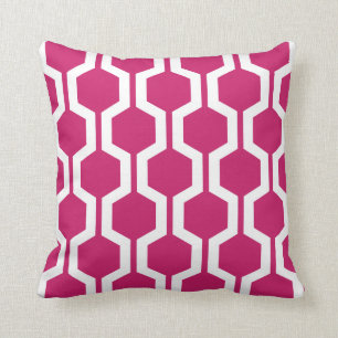 Cojín decorativo geométrico en rojo fucsia