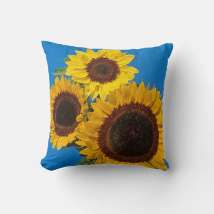 Cojín Decorativo Girasoles contra cerca azul