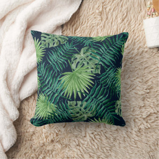 Cojín Decorativo Hojas de acuarela tropicales sobre fondo azul mari