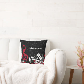 Cojín Decorativo Jumble Music Notes Red White Gray sobre el negro