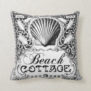 Cojín Decorativo la cabaña de la playa con el mar descasca el