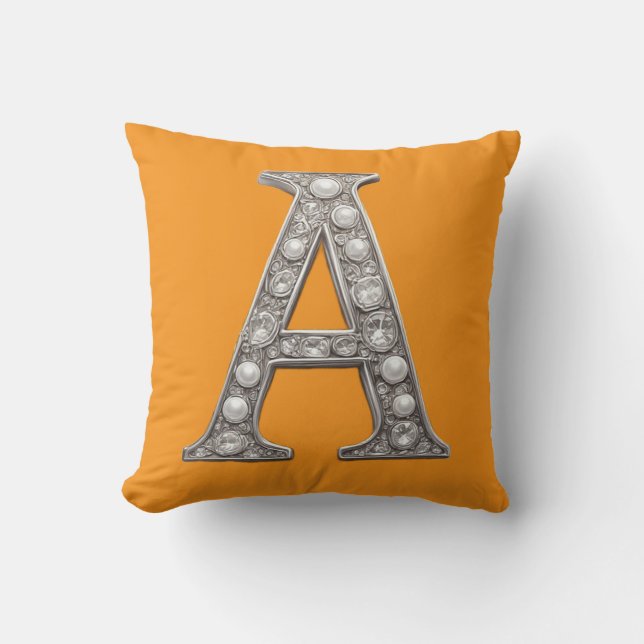 Cojín Decorativo Letra A con joyas sobre fondo amarillo (Anverso)