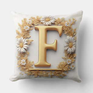 Cojín Decorativo Letra dorada F con decoración de corona floral