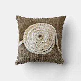 Cojín decorativo marrón con bobina blanca
