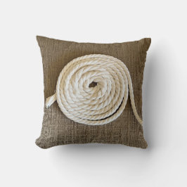 Cojín decorativo marrón con bobina blanca