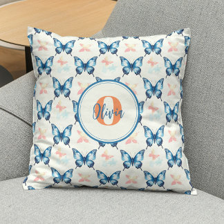 Cojín Decorativo Monograma de mariposas azules con estilo acuarela