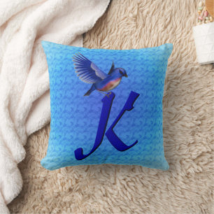 Cojín Decorativo Monograma de pájaro azul Inicial K