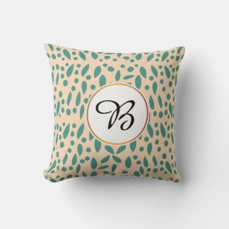 Cojín Decorativo monogramo y hojas estampadas
