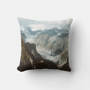 COJÍN DECORATIVO MONTAÑAS CUBIERTAS DE NIEVE DURANTE EL DÍA