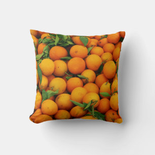 Cojín Decorativo Muchos Naranjas con hojas verdes
