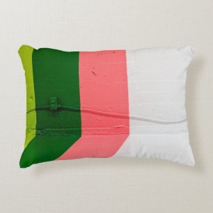 Cojín Decorativo Muros pintados de blanco, rosa, verde y amarillo