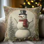 Cojín Decorativo Navidades Cosy Vintage Snowman<br><div class="desc">Disfrute de un ambiente nostálgico durante sus vacaciones en su hogar con este diseño de snowman de estilo vintage. Perfecto para crear un ambiente Navidad acogedor, este escenario de invierno clásico es ideal para una casa de campo, una cabaña o una decoración tradicional de vacaciones. Un acento atemporal de temporada...</div>