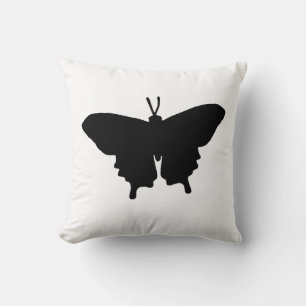 Cojín decorativo negro y blanco de mariposa