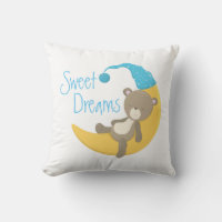 Oso de peluche sobre guardería de luna creciente
