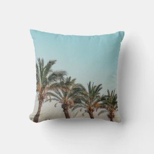 COJÍN DECORATIVO PALMERAS VERDES BAJO CIELO AZUL