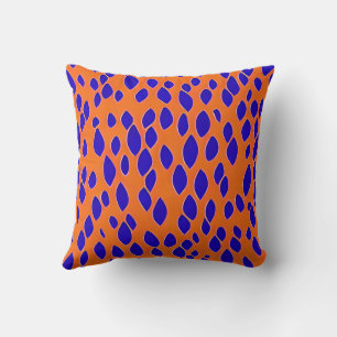Cojín Decorativo Parches azules oscuros sobre el naranja.