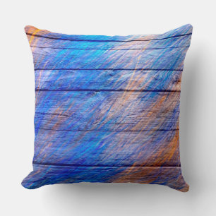 Cojín Decorativo Pastel colorido sobre la madera