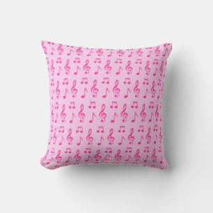 Cojín Decorativo Patrón continuo de notas musicales en tonos rosado