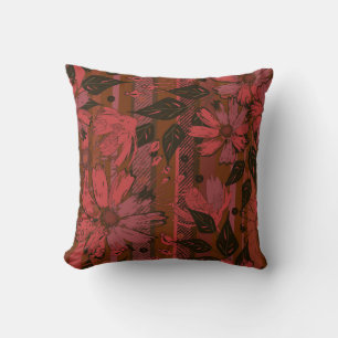 Cojín Decorativo Patrón floral negro y rojo.