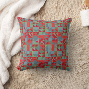 Cojín Decorativo Patrón geométrico rojo, gris y verde.