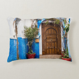 COJÍN DECORATIVO PLANTA VERDE DE LIBERTAD CERCA DE LA PARED