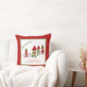 Cojín Decorativo Pueblo verde y rojo mono en la nieve en Navidad