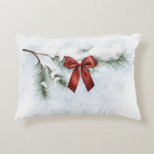 Cojín Decorativo rama de pino cubierta de nieve con un arco rojo fe