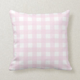 Cojín decorativo rosa claro con el modelo rosado