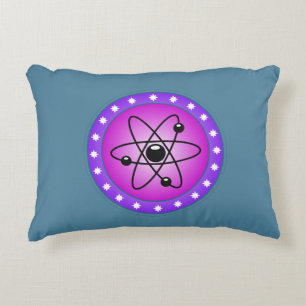Cojín Decorativo Símbolo atómico en un fondo rosado