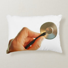 Cojín Decorativo Stethoscoop in een hand voor een ziekenhuis sfeer.