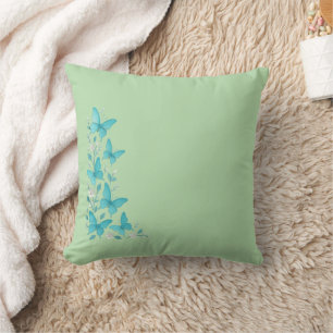 Cojín Decorativo Sueños de Mariposa Azul – Diseño Desi de Naturalez