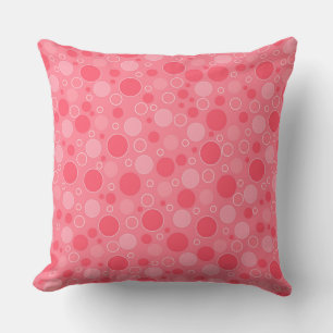 Cojín Decorativo tonos rojos de coral con puntos de polka en los añ