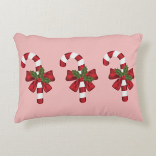 Cojín Decorativo Tres caramelos de Navidad en rosa claro