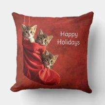 Tres gatitos en una media de Navidad