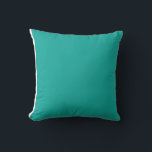 Cojín Decorativo un fondo verde con<br><div class="desc">El diseño es un cuadrado azul brillante con un color uniforme y una textura suave. Se destaca en el fondo con un sorprendente contraste visual.</div>