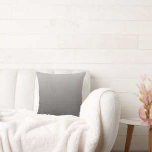 Cojín Decorativo una foto en blanco y negro de una pared_
