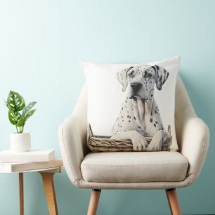 COJÍN DECORATIVO VISTO GRAN DANÉS EN CESTA DE ROPA SUCIA