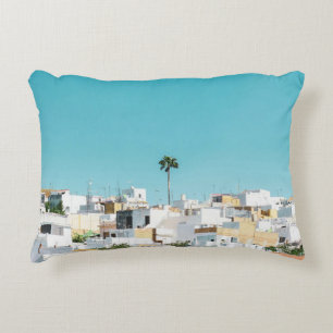Cojín Decorativo White and brown concrete houses under blue sky in
