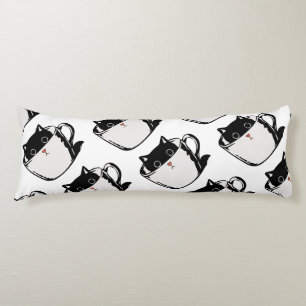 Cojín Gatito negro con nariz roja escondido en una taza