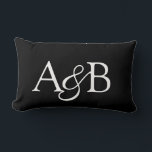 Cojín Lumbar Ampersand Monogram Black and White Couple<br><div class="desc">Whether for a gift for newlyweds,  anniversary,  or home design,  this addition to your home decor features initials and an ampersand. If needed,  position the letters to touch one part of the ampersand. The back of the pillow is solid black.</div>
