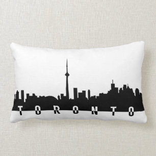 Cojín Lumbar silhoue del negro del símbolo de la ciudad de