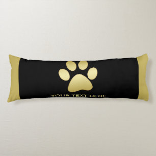 Cojín Paw dorada de perro brillante sobre fondo negro