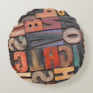 Cojín Redondo antique letterpress ing blocks with color ink pati