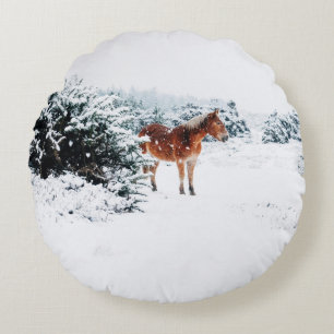 COJÍN REDONDO CABALLO EN LA NIEVE CAÍDA