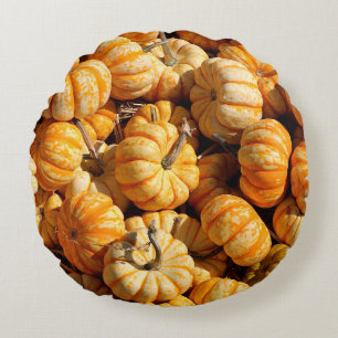 Cojín Redondo calabazas pequeñas en la pila