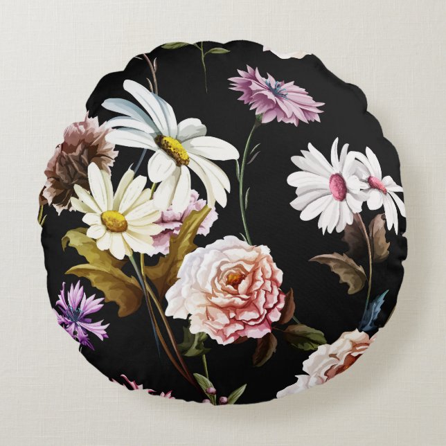 Cojín Redondo Carnación, flores de camomila, patrón negro. (Anverso)